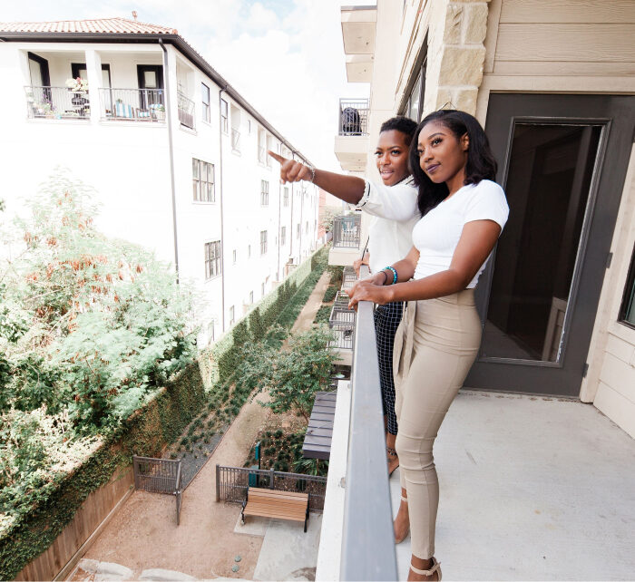 Renters touring an apartment community